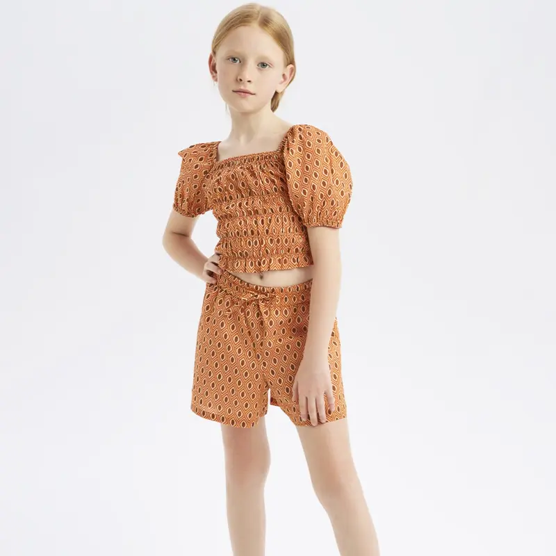 Completo bambina arancio fantasia