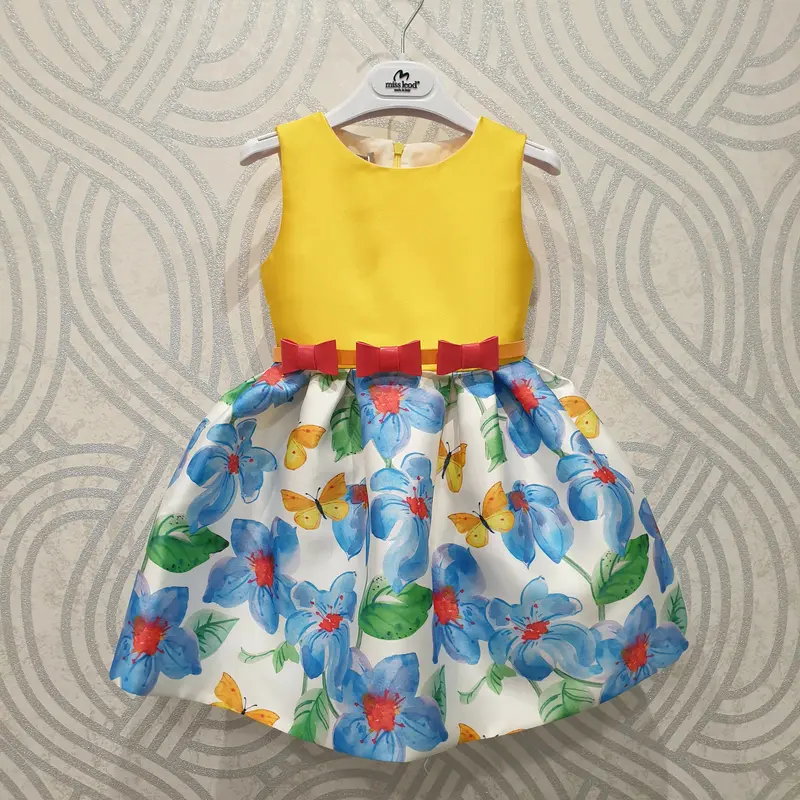 Vestito bambina con corpetto giallo e fondo fiorato