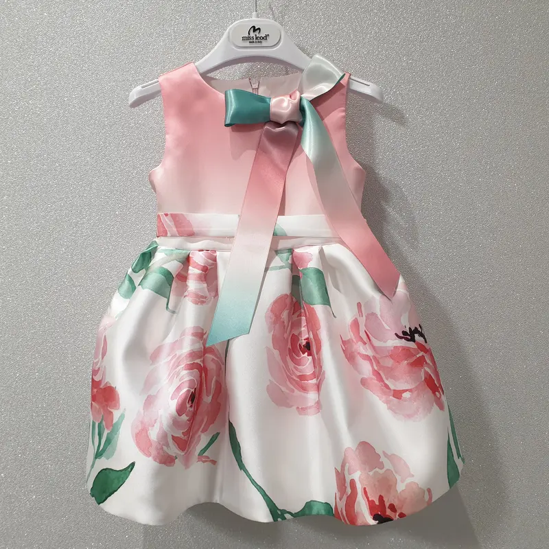 Vestito bambina tonalità sul rosa con fiocco sul collo