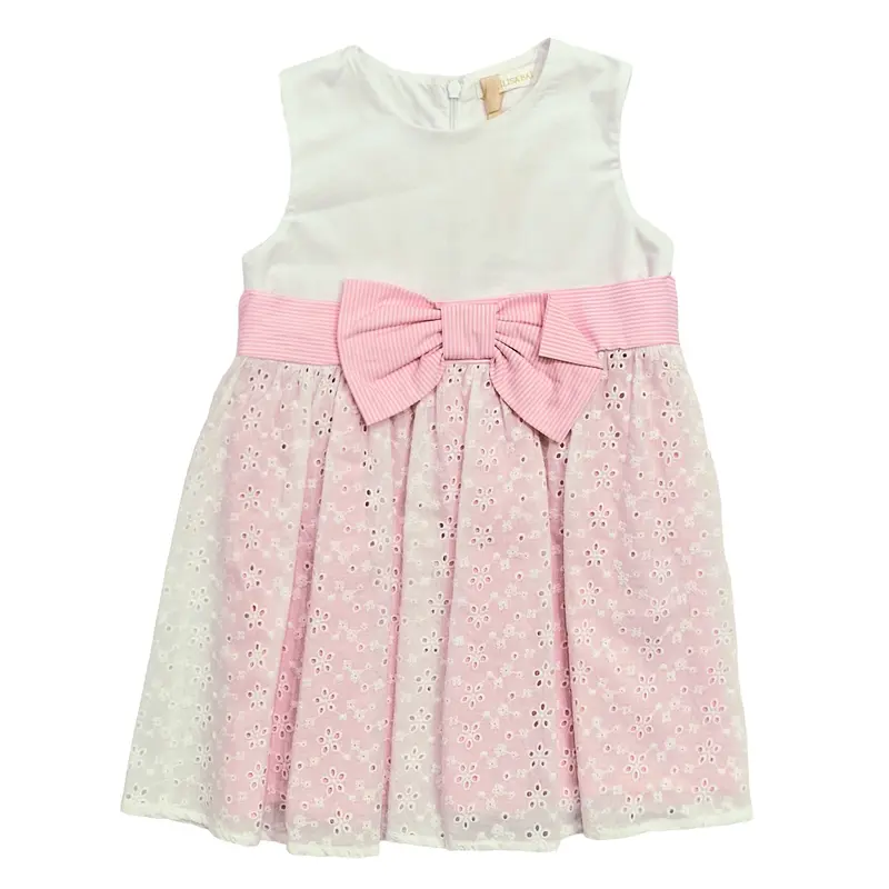 Vestito in pizzo rosa con fiocco su corpetto bianco
